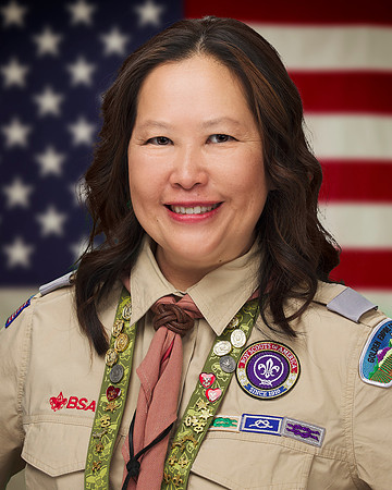 Irene Harris tight headshot w flag -flat+PorPro-8x10